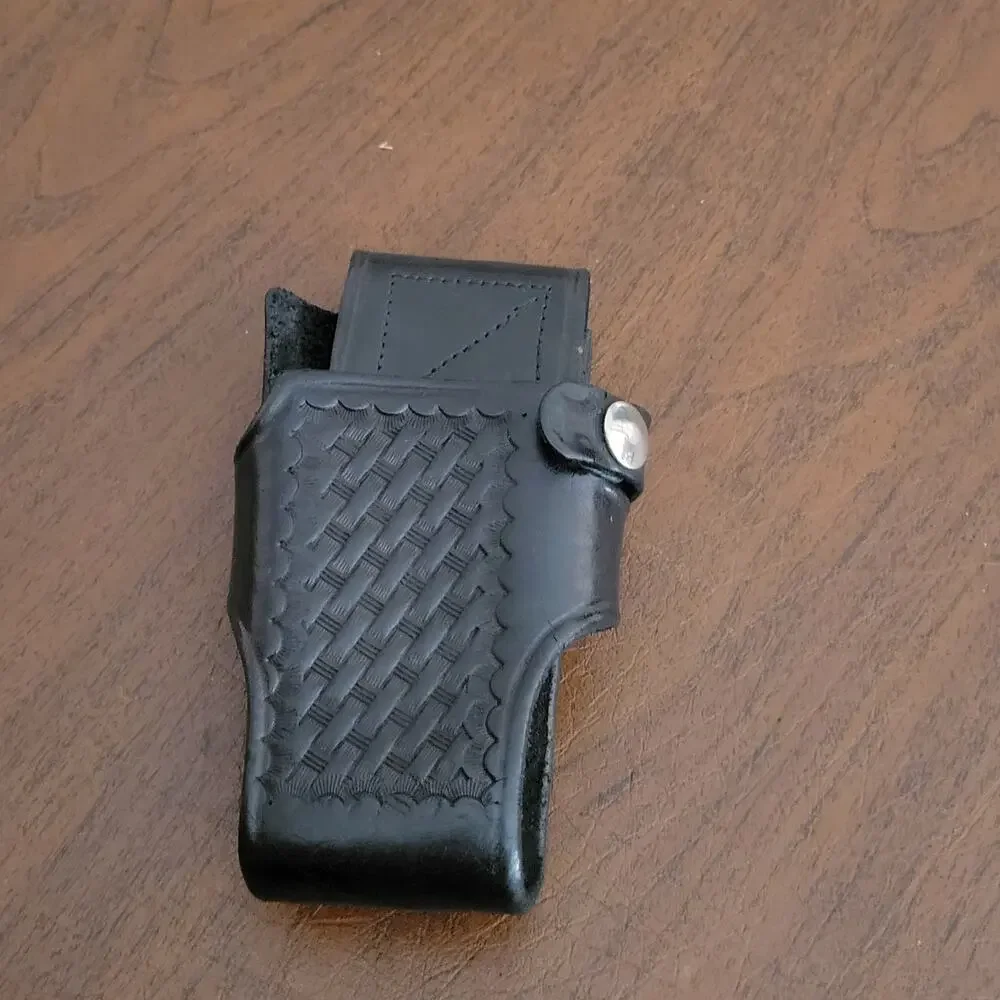 Triple K 890 Black Leather Radio Holster. Pre-owned, good shape.